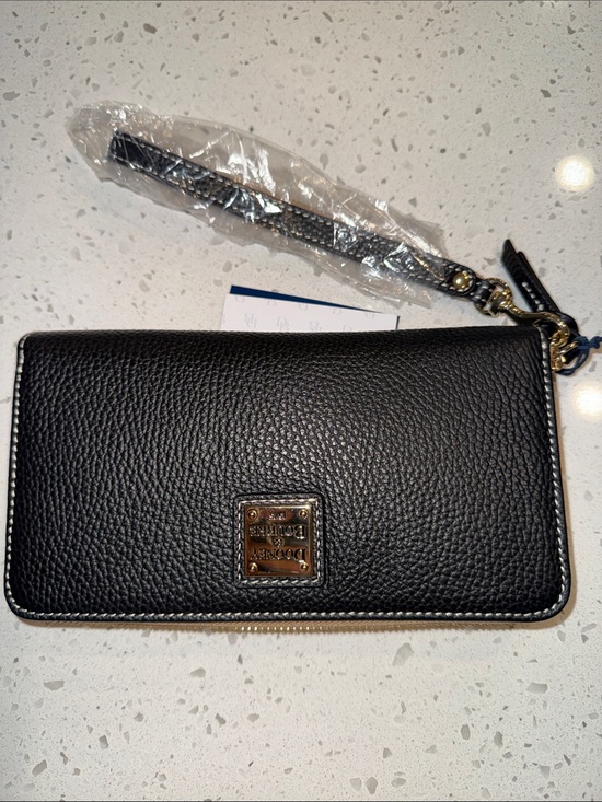 Dooney & Bourke Handbags - Dooney and Bourke Lucca Leather large ziparound wristlet Black New With Tags